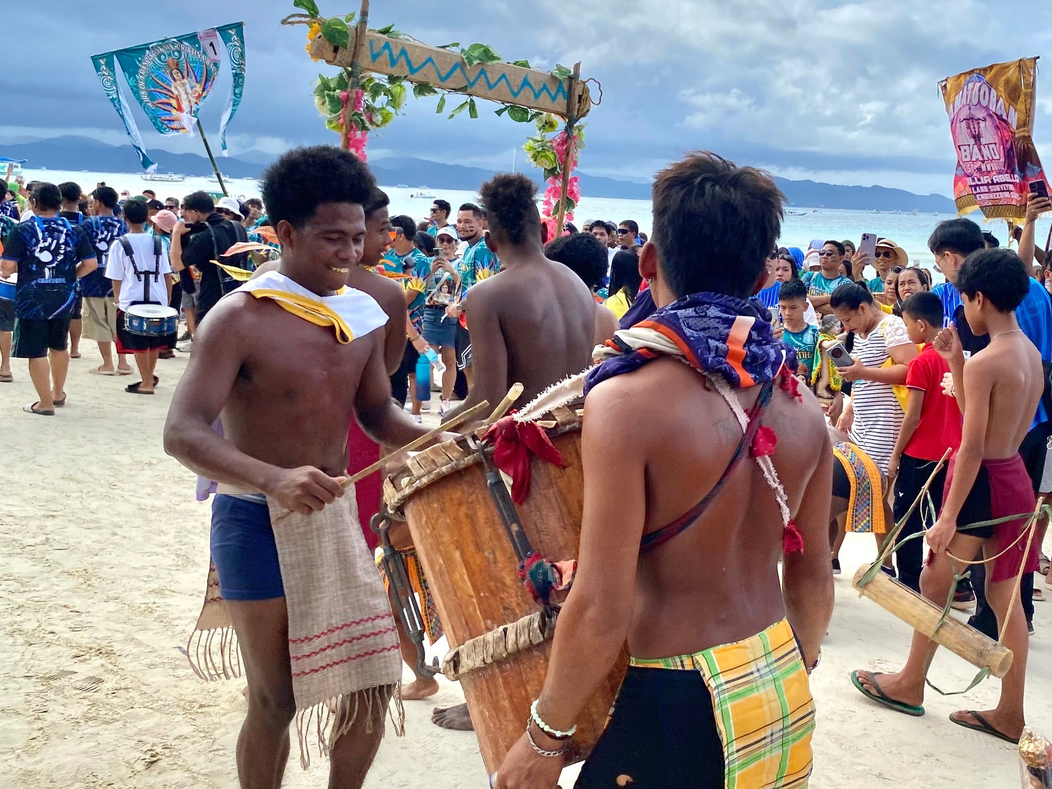 Ati-Atihan Festival drummers on the beach